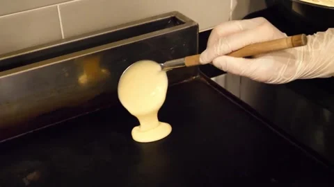 Chef Pouring Smooth Batter Onto Hot Flat Top Griddle Stock-Footage 345291598