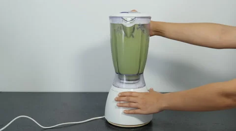 Chef pouring water to the Blender for making green tea Stock Footage 67153310