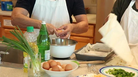 Chef Pours Egg into Bowl Stock Footage 61434653