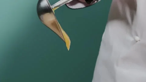 The chef pours sauce over the dish Stock-Footage 306804062