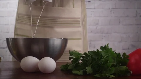 Chef prepare dough and cracks egg into bowl, slow motion hd video Stock Footage 71765336