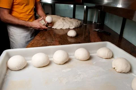 Chef prepare the dough for pizza Stock Photos