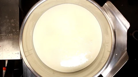 Chef prepared melted liquid white chocolate and mix liquid dark chocolate. Stock Footage 127532311