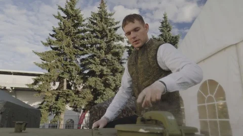 Chef prepares buckwheat in field kitchen. Buckwheat porridge. Military field Stock Footage 98374232