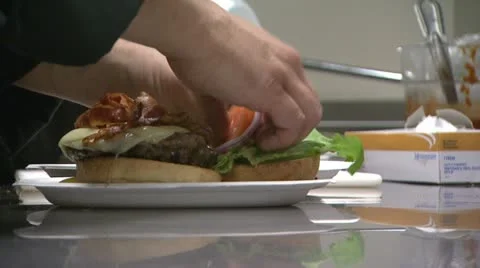 Chef Prepares Burger 2 Stock Footage 22042499