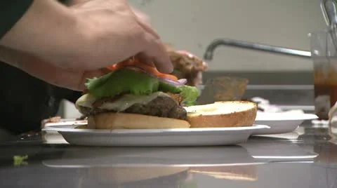 Chef Prepares Burger Video stock 22042409