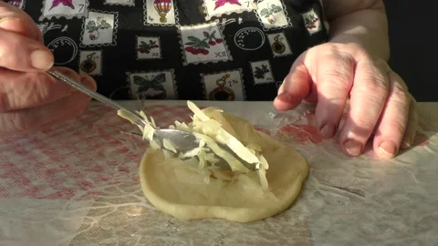 The chef prepares cabbage pies Stock Footage 164030913