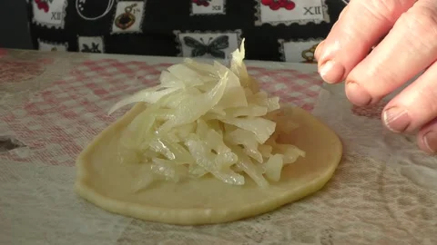 The chef prepares cabbage pies Stock Footage 164032549