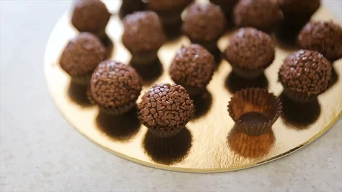 The chef prepares a cake pop and decorates them on table Stock Footage 102368770