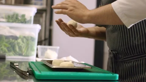 The chef prepares cheese pancakes in the kitchen of the cafe. Stock Footage 277131621
