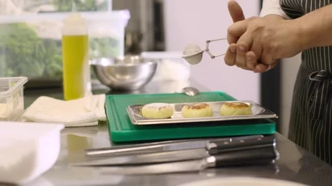 The chef prepares cheese pancakes in the kitchen of the cafe. Stock-Footage 277131684