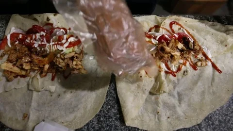 Chef-prepares-Chicken-Shawarma-wrap Stock Footage 75745354