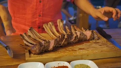 Chef prepares chops for service Video stock 102415350