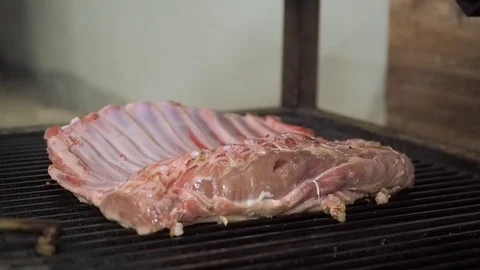 Chef prepares chops for service Stock Footage 102415443
