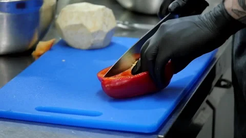 Chef Prepares to Cook the Peppers Stock Footage 131640840