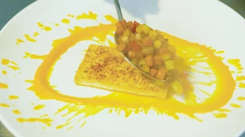 Chef prepares, decorates the dish on a plate,fried tofu, vegetarian food Video stock 113109222