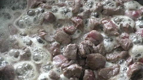 The chef prepares deer meat in a frying pan. healthy food concept Stock Footage 151018620