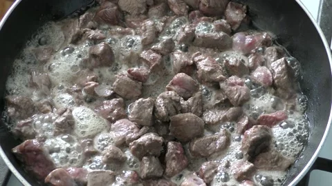 The chef prepares deer meat in a frying pan. healthy food concept 스톡 동영상 151018789