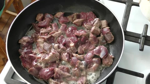 The chef prepares deer meat in a frying pan. healthy food concept Stock Footage 151020408