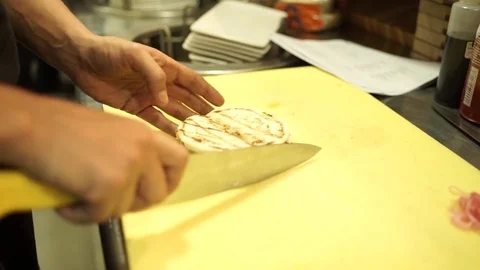 The chef prepares a delicious Burger Stock Footage 71493159