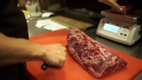 The chef prepares delicious steak Stock Footage 71494318