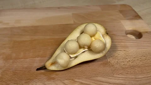 The chef prepares a dish of cheese and pear Video stock 306803794