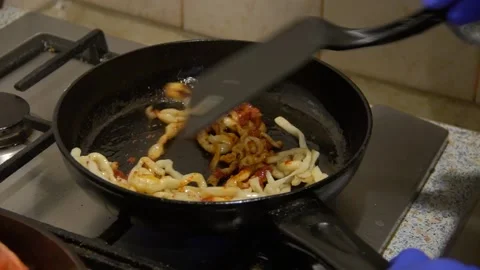 The chef prepares a dish of pasta Stock Footage 142665104
