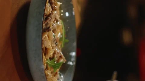 The chef prepares the dish. Slow motion. 120 fps. Vertical video Stock Footage 172439974