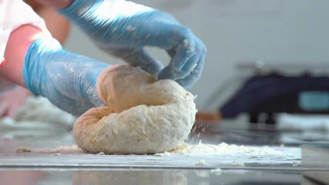The chef prepares the dough for the pie Stock Footage 158021677