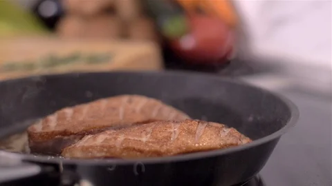 The chef prepares duck breasts in a pan Video stock 110035814