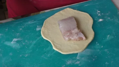 The chef prepares a fish pie Stock Footage 198979085