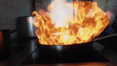 Chef Prepares Food in a Restaurant Stock Footage 137932632