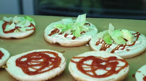 Chef prepares hamburger buns  Stock Footage 65670758