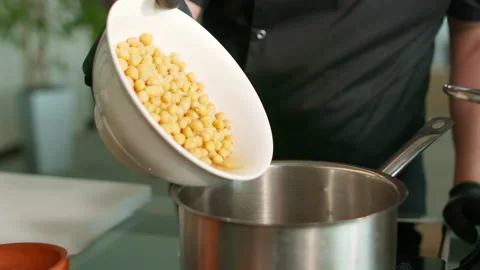 The chef prepares the hummus Stock Footage 136998579