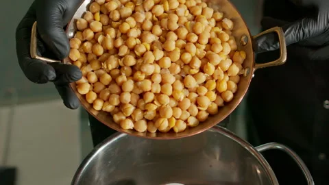 The chef prepares the hummus Stock Footage 136999030
