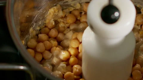The chef prepares the hummus Stock Footage 136999357