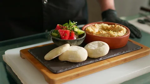 The chef prepares the hummus Stock Footage 137000128