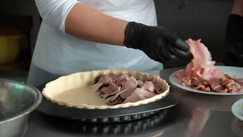The chef prepares the ingredients for the lasagna Stock Footage 137828015