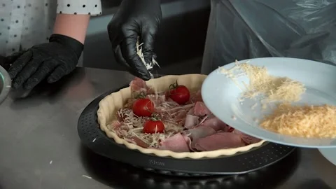 The chef prepares the ingredients for the lasagna Stock-Footage 137828023
