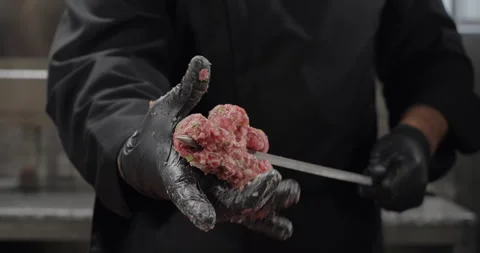 Chef prepares kebab, shapes Turkish Adana kebab, spreads ground meat along the Stock Footage 274364111