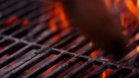 Chef Prepares Large Bone-in Ribeye Tomahawk Steak On Fire Grill Stock Footage 288038763
