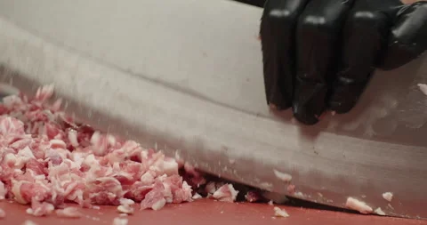 Chef prepares meat for Adana kebab, chops fat meat with a big knife. Handmade Stock Footage 269065400