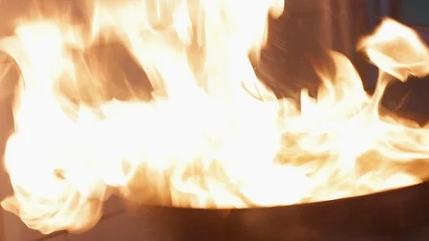 Chef prepares meat with big fire. Stock Footage 87641859
