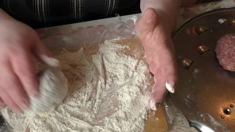 The chef prepares meat cutlets Stock Footage 167105413