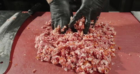 Chef prepares minced meat with hands for kebab, patties, sausages. Male hands Stock Footage 260846720