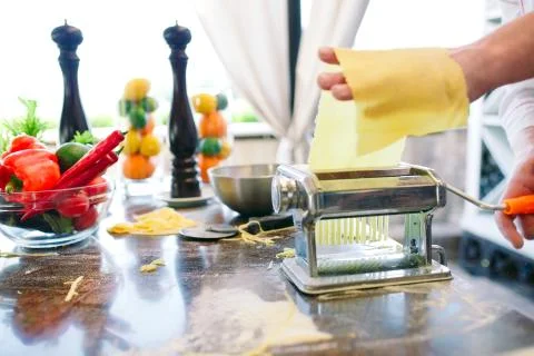 The chef prepares the paste for the visitors. Stock Photos