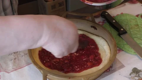 The chef prepares a pie with berries Stock Footage 167105754