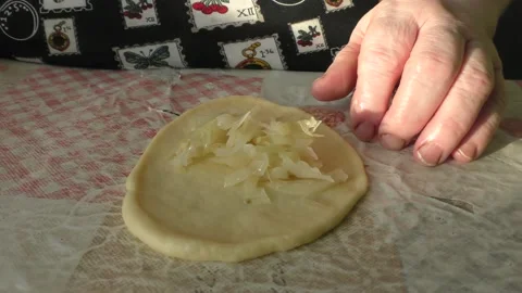 The chef prepares pies with cabbage Stock Footage 167105492