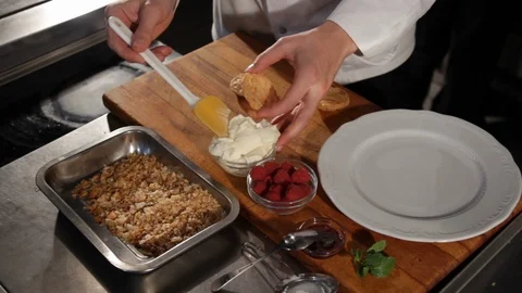 The chef prepares Raspberry Millefeuille. Cooking process. Napoleon cake Stock Footage 116774083