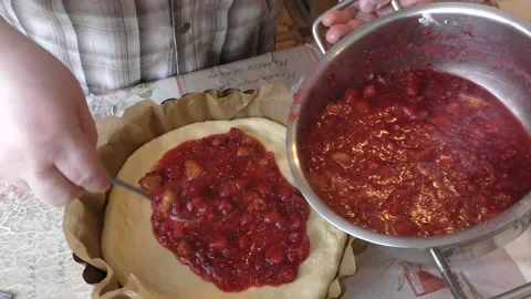 The chef prepares a raspberry pie Stock Footage 164360980